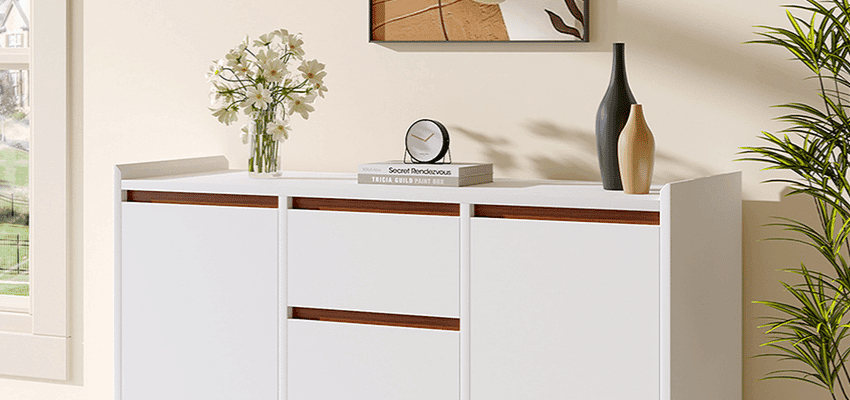 Home interior with white storage cabinet, flowers, books and vases, shown to highlight stylish homeware options available with Purpl discounts for people with disabilities and long term health conditions, helping with affordable home essentials and accessible shopping discounts.