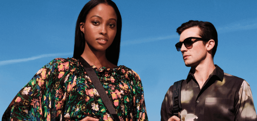 Man and woman wearing designer clothing outdoors promoting Secret Sales fashion offers with disabled discounts in the UK