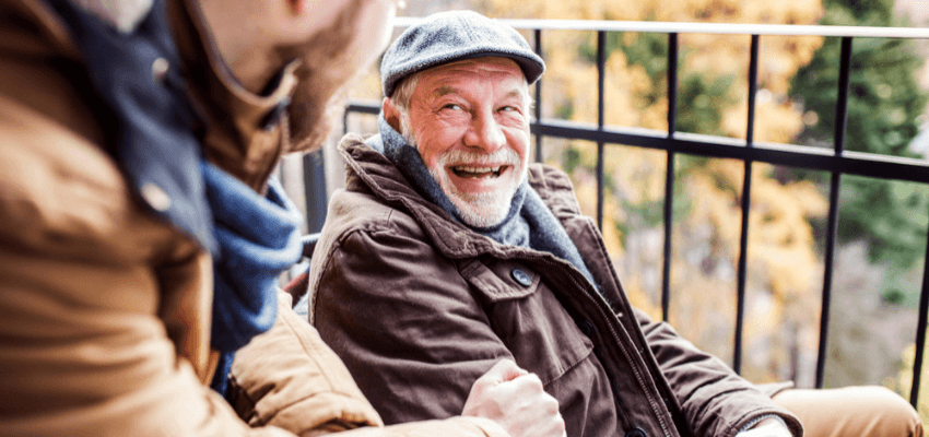 Smiling older man chatting outdoors, Country Cousins Purpl discounts for disabilities and long term health conditions, mobility discounts and offers.