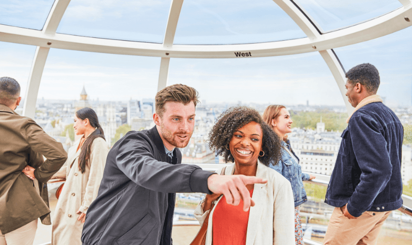 Group of people enjoying the panoramic city view from inside a London Eye pod, perfect for accessible days out and mobility discounts and offers.