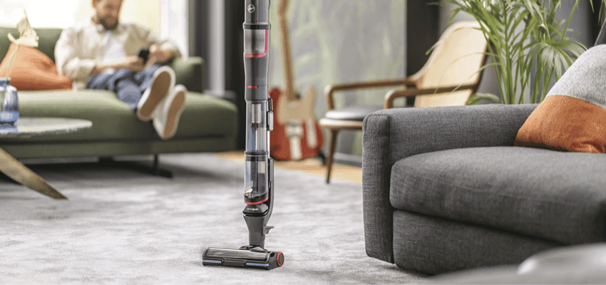 Upright cordless vacuum on living room carpet, Hoover Direct Purpl discounts for disabilities and long term health conditions, mobility discounts and offers.
