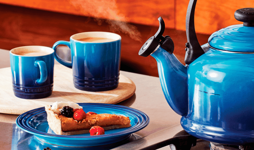Blue kettle and mugs with pastry, Le Creuset; Purpl discounts for disabilities and long term health conditions, mobility discounts and offers.