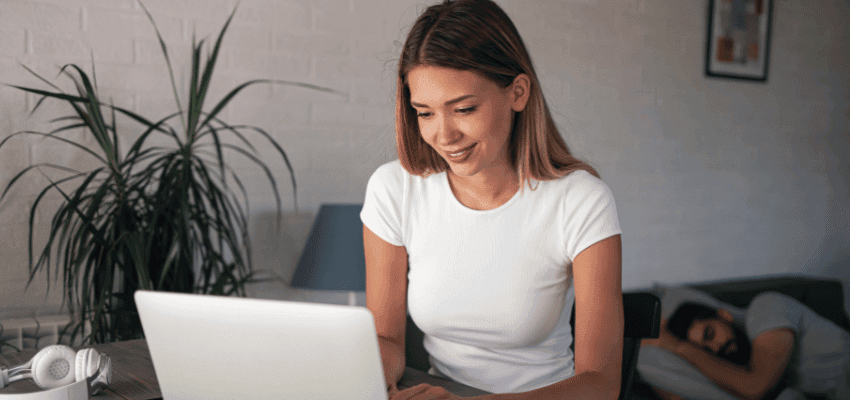 Woman using a laptop at home, Harley Street ADHD Purpl discounts for disabilities and long term health conditions, shopping discounts for disabled people.