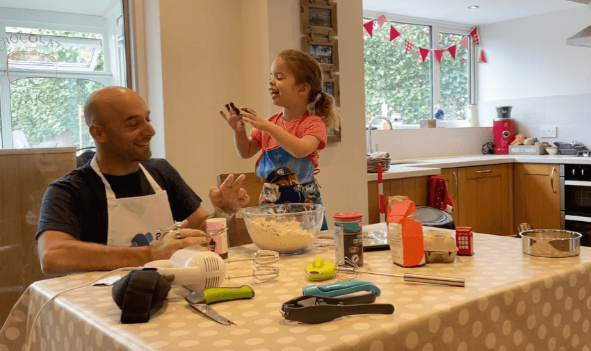 Father and child baking in kitchen, Active Hands Purpl discounts for disabilities and long term health conditions, mobility discounts and offers.