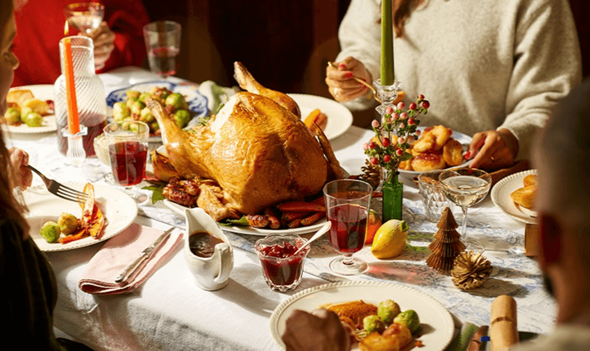 Family roast dinner table with turkey, Field & Flower Purpl discounts for disabilities and long term health conditions, shopping discounts for disabled people.