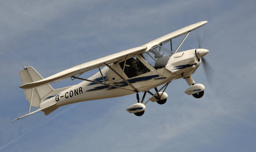 Small light aircraft flying in the sky, Ablenet Purpl discounts for disabilities and long term health conditions, mobility discounts and offers.