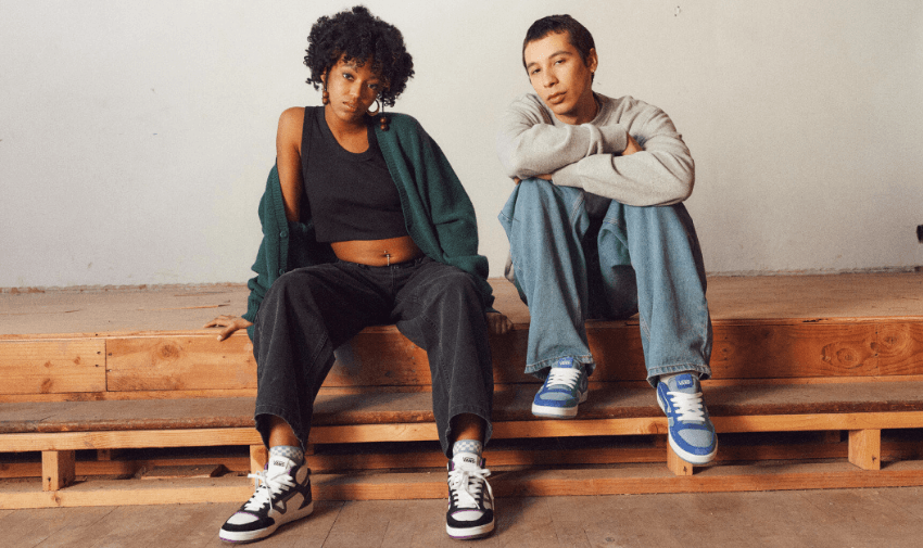 Two models in Vans trainers sitting on steps, Purpl discounts for disabilities and long term health conditions, shopping discounts for disabled people.