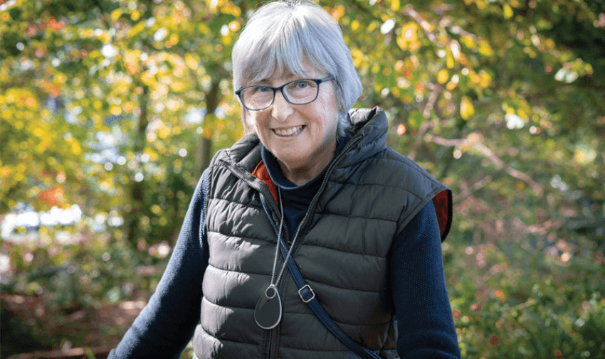Smiling older woman outdoors, Taking Care Purpl discounts for disabilities and long term health conditions, mobility discounts and offers.