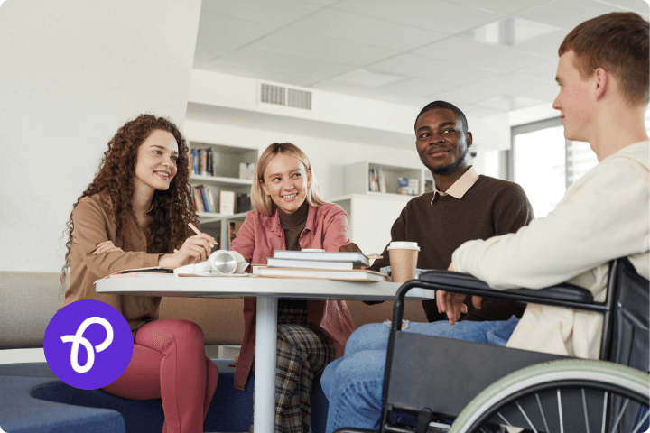A group of disabled people sat around a table in an article about PIP changes 2025
